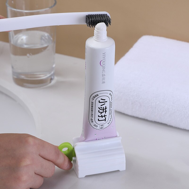 Mini Rolling Tube Toothpaste Squeezer Dispenser Seat Holder Stand Easy